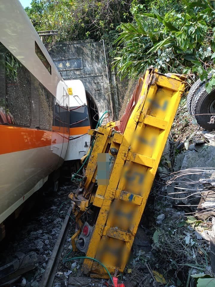 Taiwan train crashes into truck and derails, kills 36 and injures many
