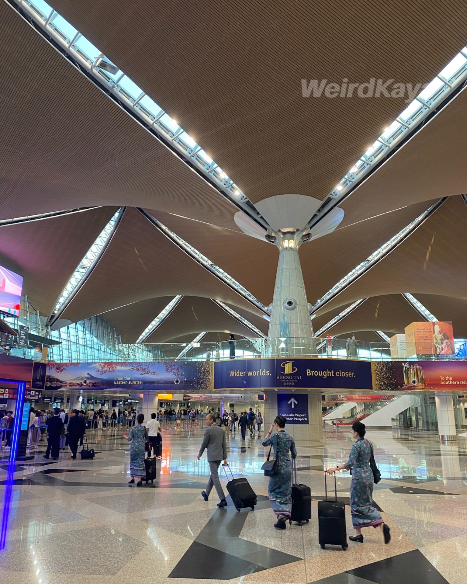  wk cabin crew at klia airport lobby departures 