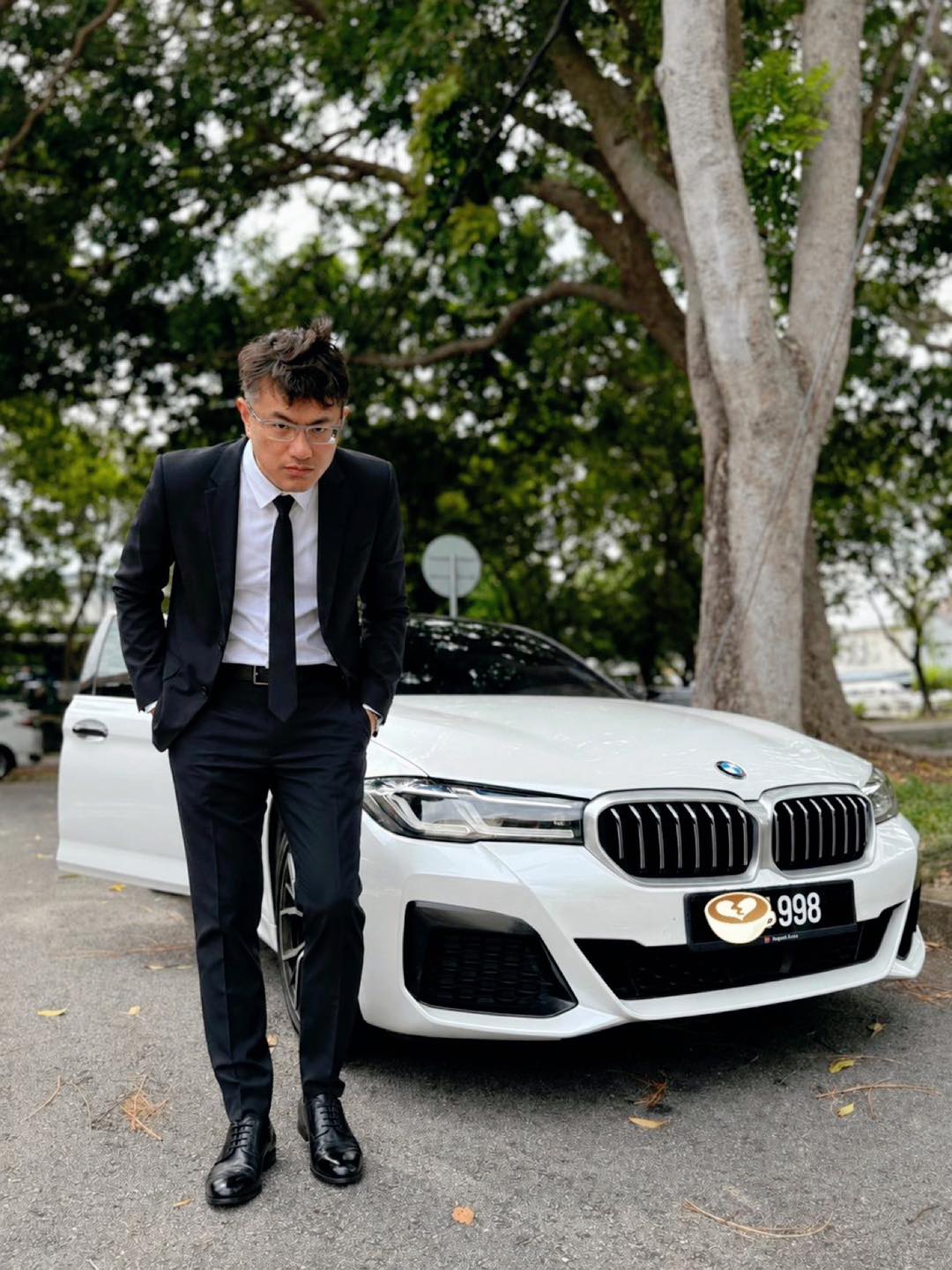 wk wang lee hom malaysia bmw driver