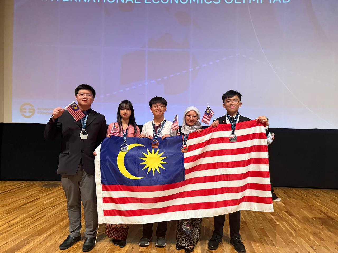 wk with econ olympiad team