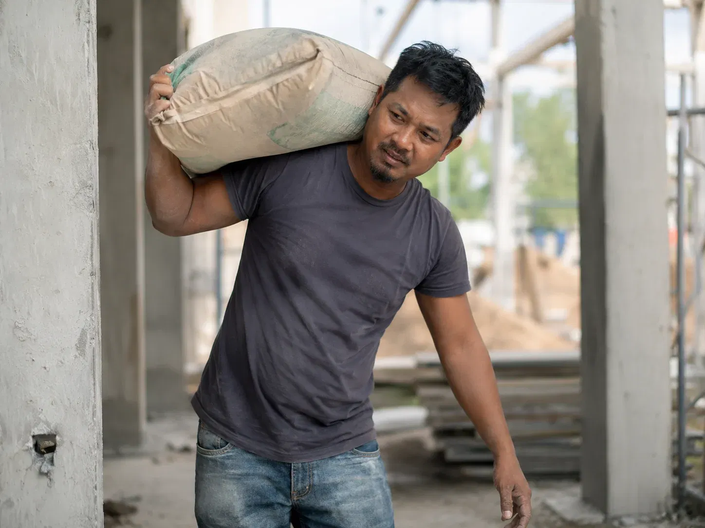  wk laborer at construction site under strain 