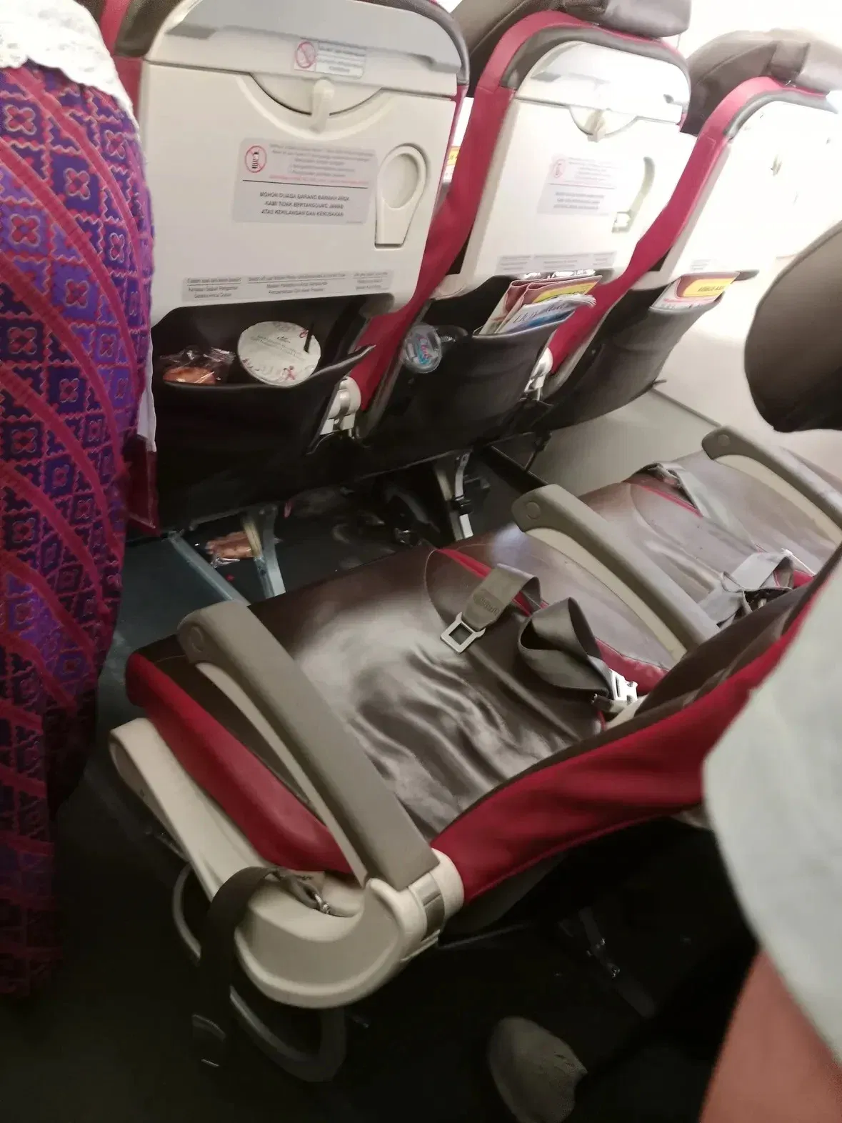 wk passenger from china allegedly ignores crew warning before power bank catches fire mid flight.