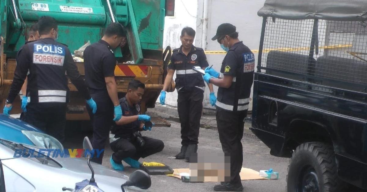 Police are taking details from the dead body of the newborn baby