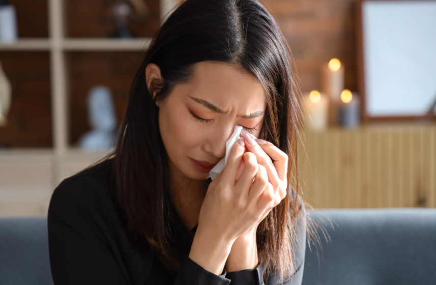 Asian woman crying
