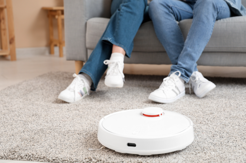 Couple with robot vacuum