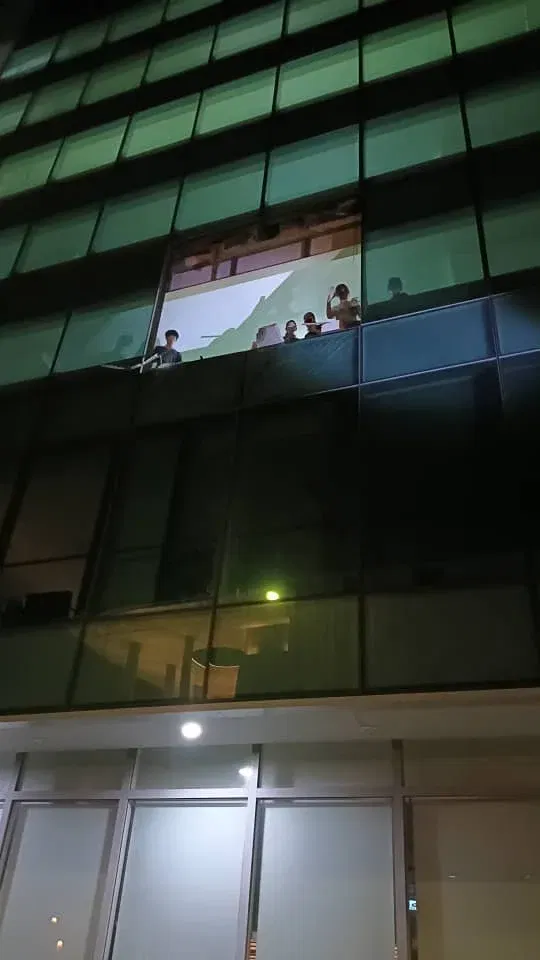 People see BMW fallem off from building 2nd floor parking lot