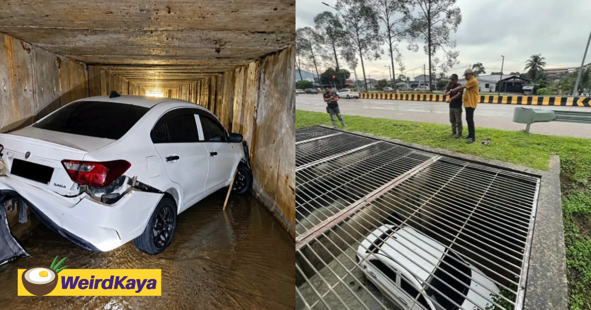 Proton Saga Gets Stuck Inside Drain Following Downpour While Owner Waited For It To Be Towed | WeirdKaya