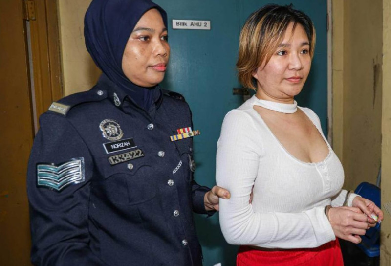 Woman accused of fraud asks for nice photos (1)