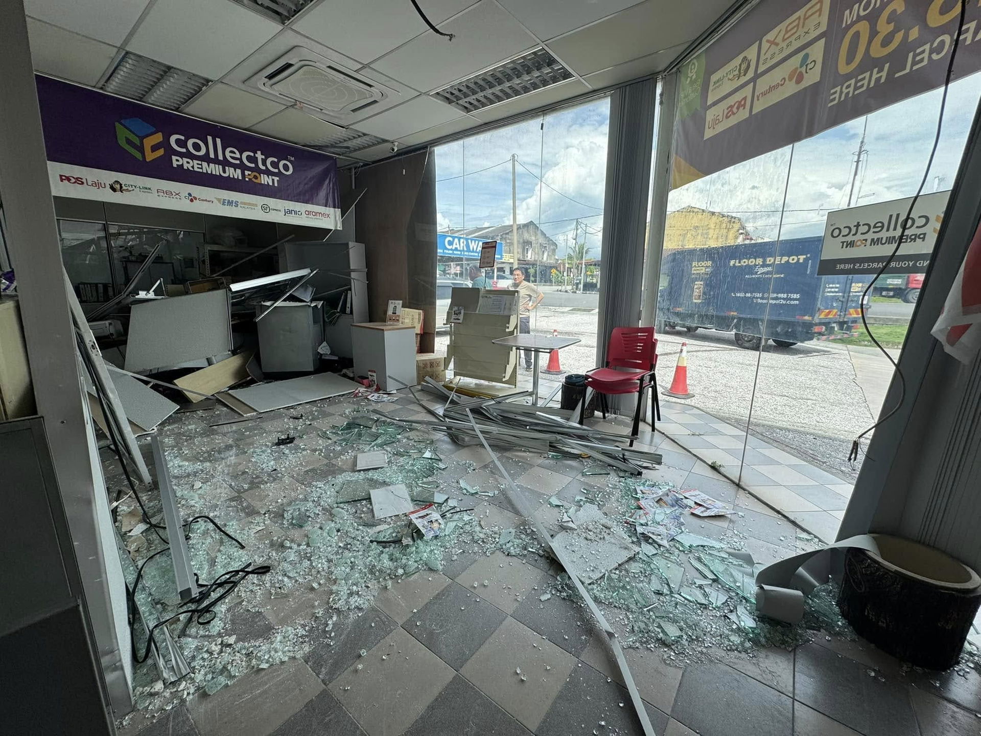 Aftermath of Myvi crashing into shop at Ipoh petrol station