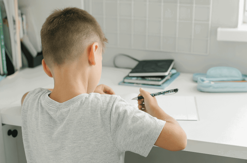 Asian boy doing homework