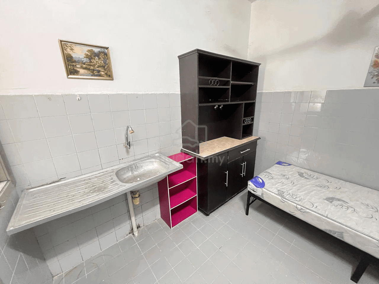 Bed with sink inside room KL (2).jpg