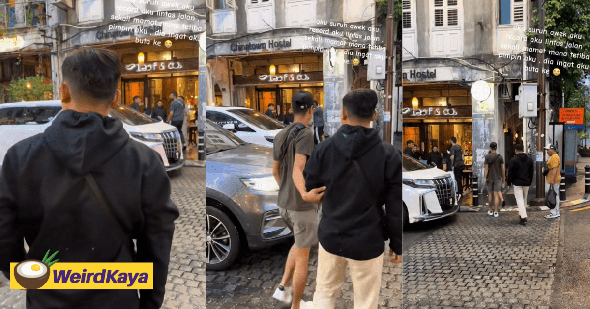 Stranger helps man cross road cover