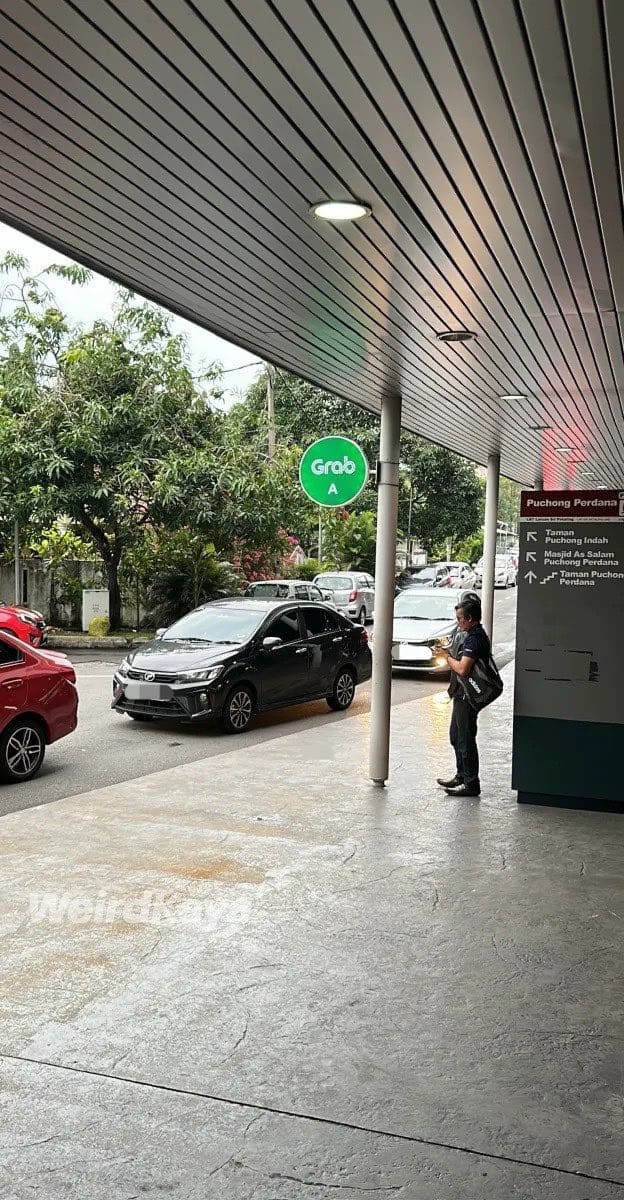 grab car ehailing waiting area grab sign