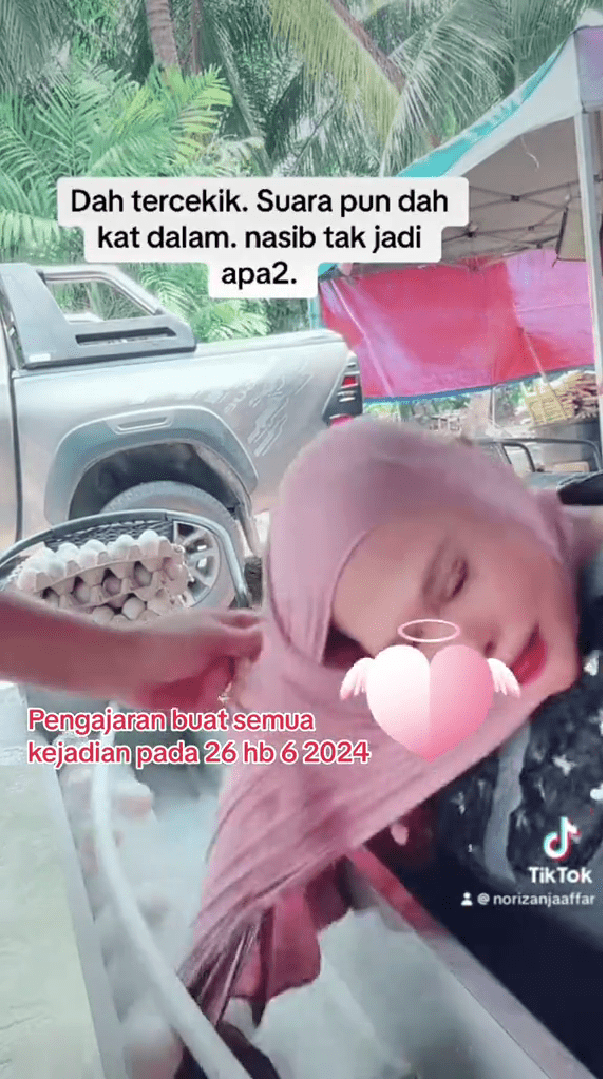 Hijab stuck in egg machine (1)
