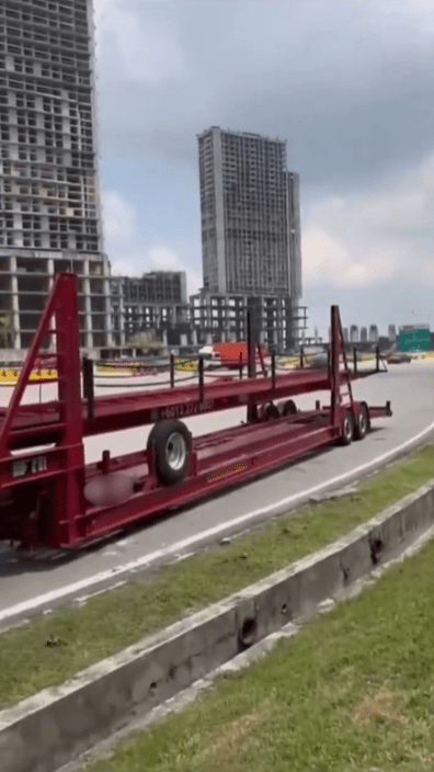 naked hitchhiker KESAS highway lying down