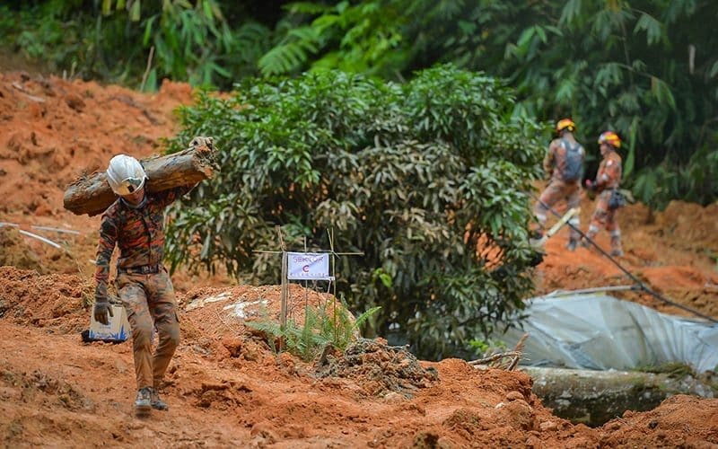 Rescuers at Batang Kali landslide