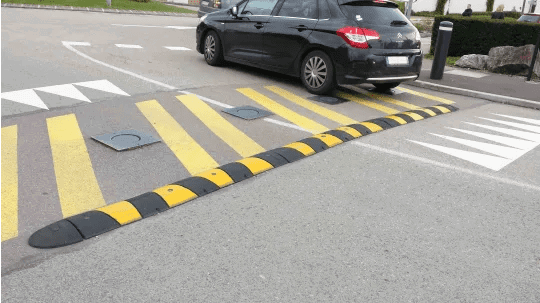 Car crossing a speed bump