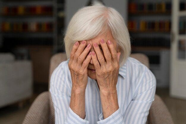 Sad old woman