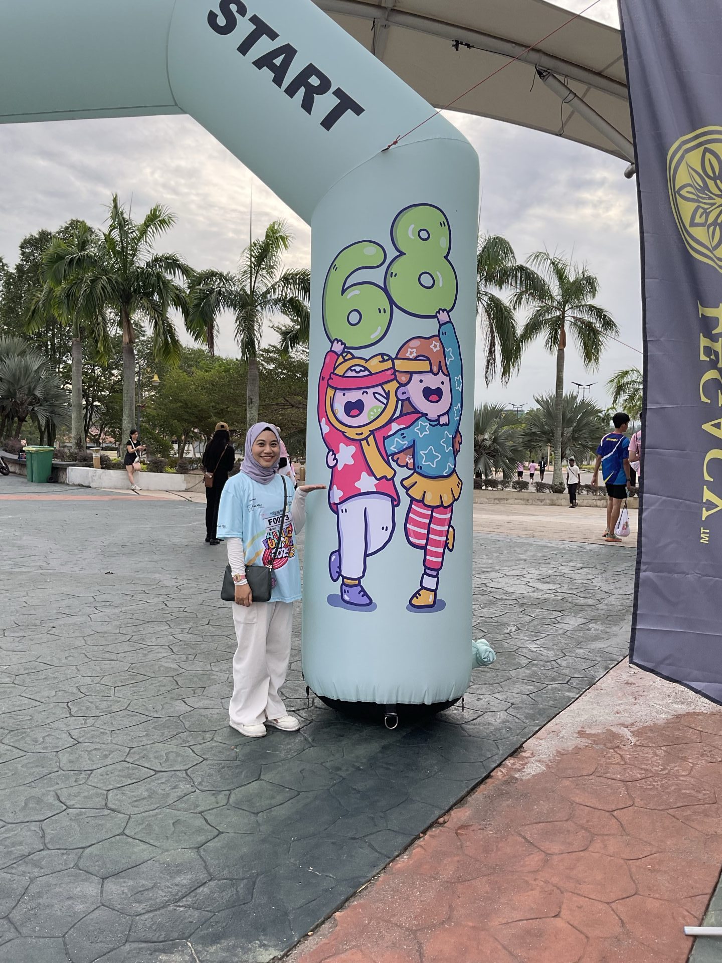Eqa with her artwork
