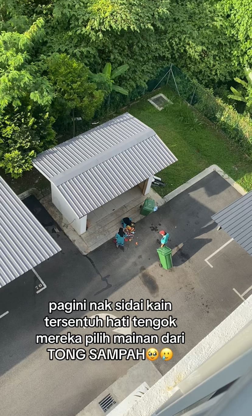 Janitors at trash site