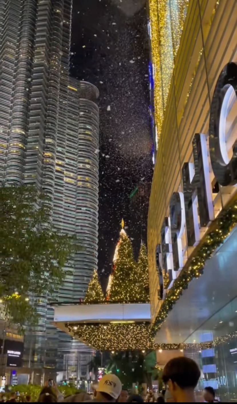 Many witnessing the fake snow from above at Avenue K