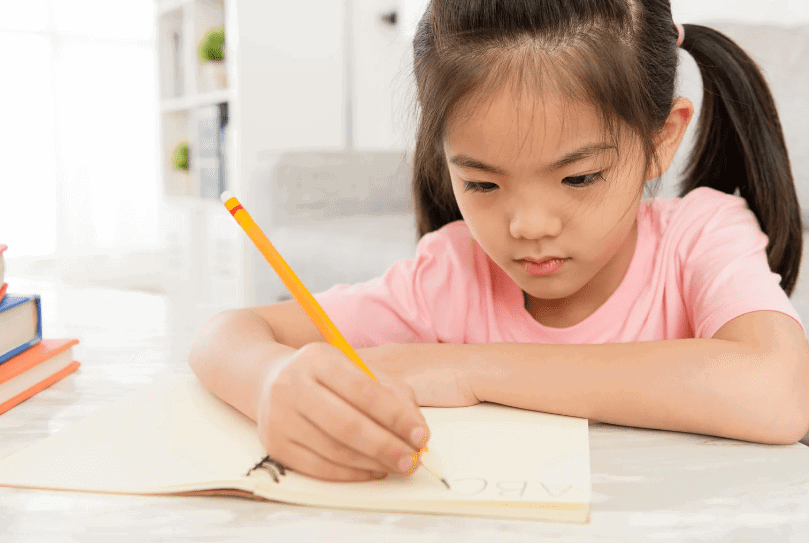 kid writing notes