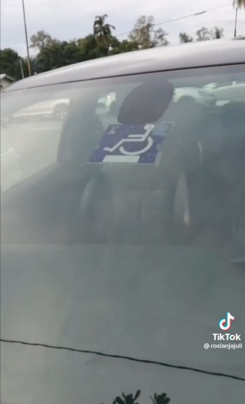 Disabled M'sian Man In A Wheelchair Sued RM20 For Parking His Car In OKU Parking Lot