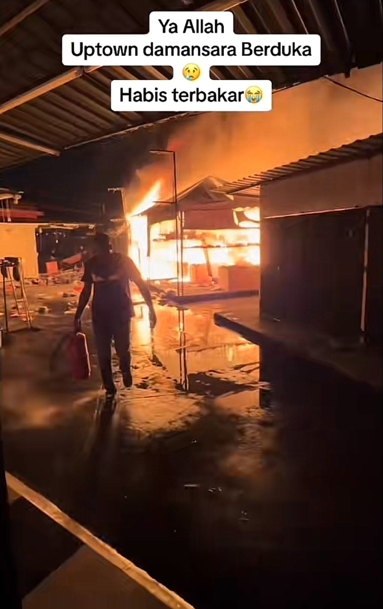 people running away from the fire