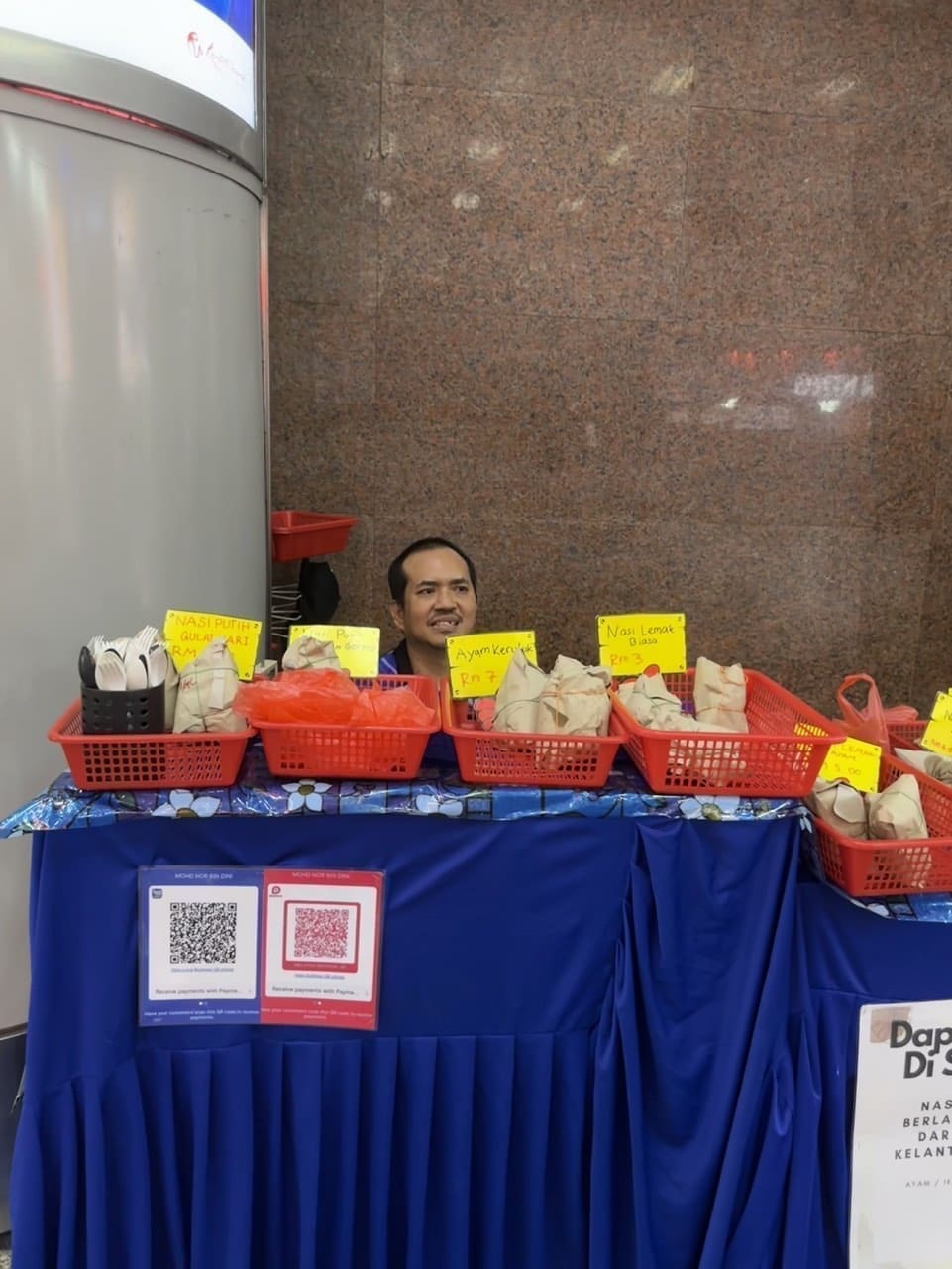 Mohd selling Nasi Lemak near Nu Sentral entrance