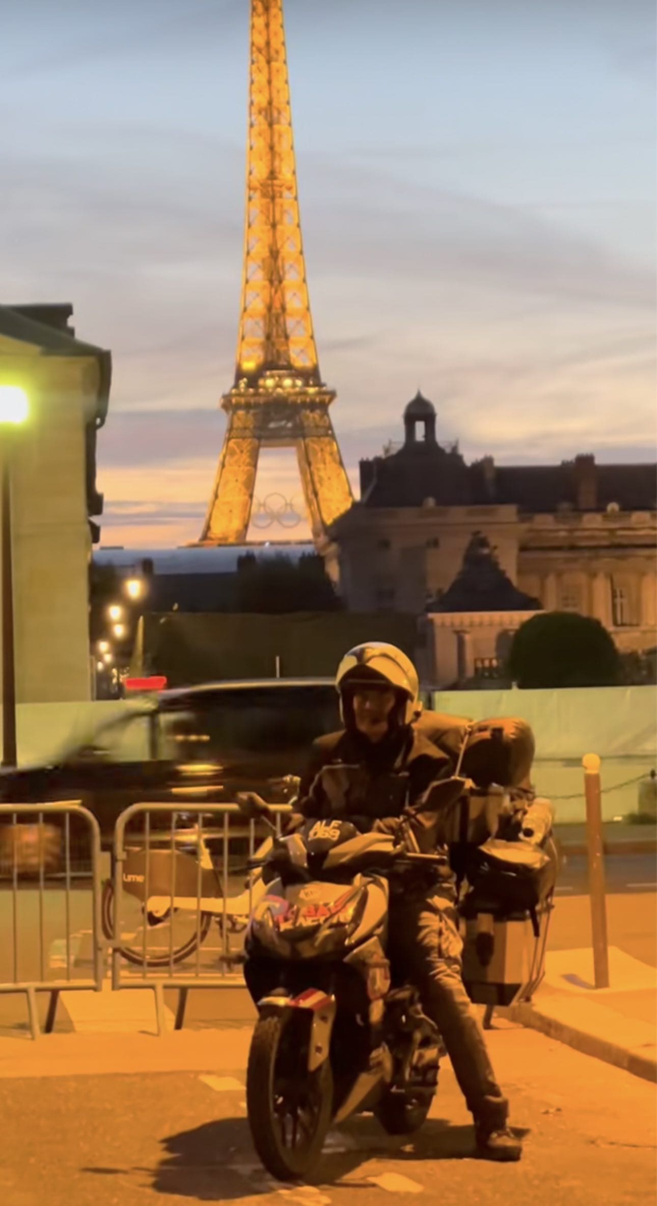 Msian man on his motor after reaching Paris