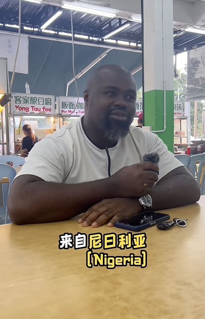 Nigerian man who is a vendor at a food court