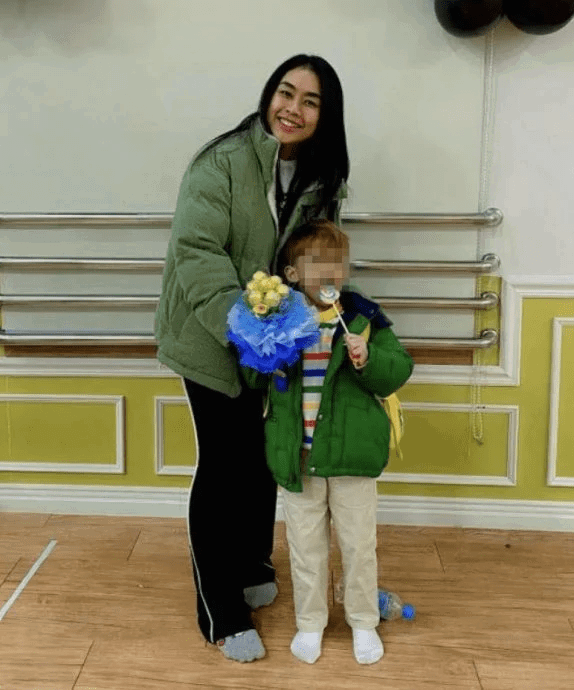 Lai Yi with her son