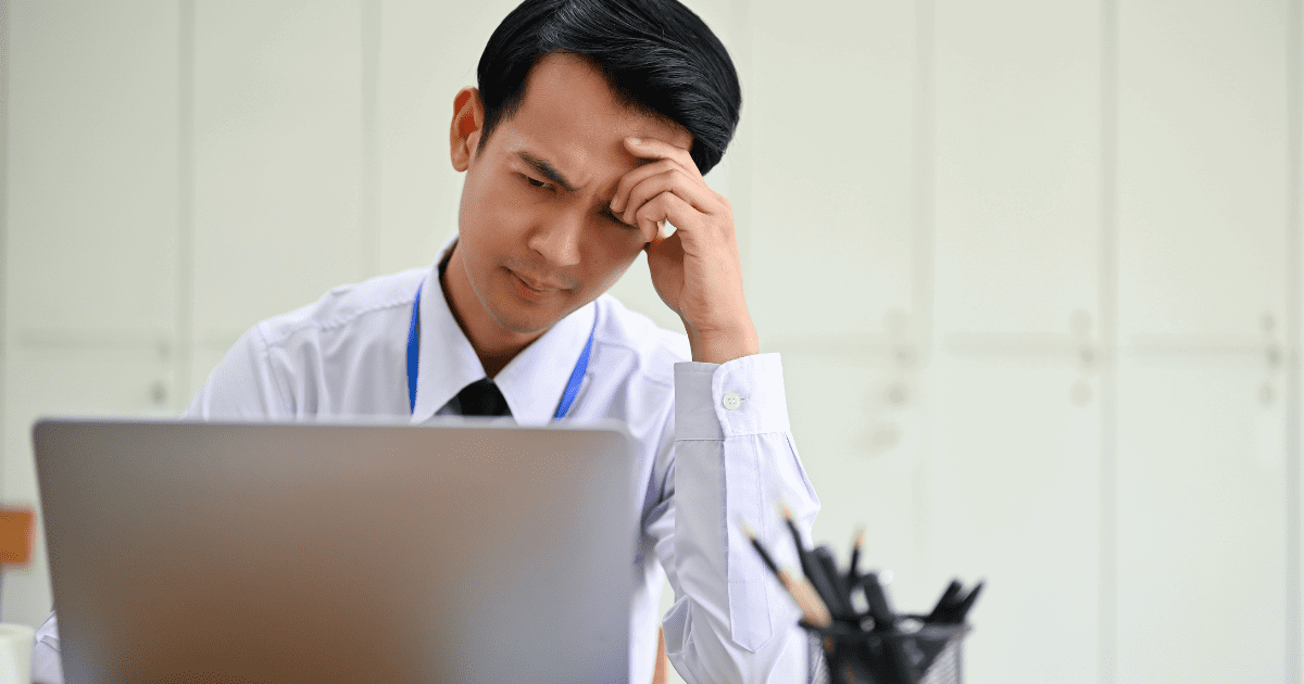 frustrated man at workplace