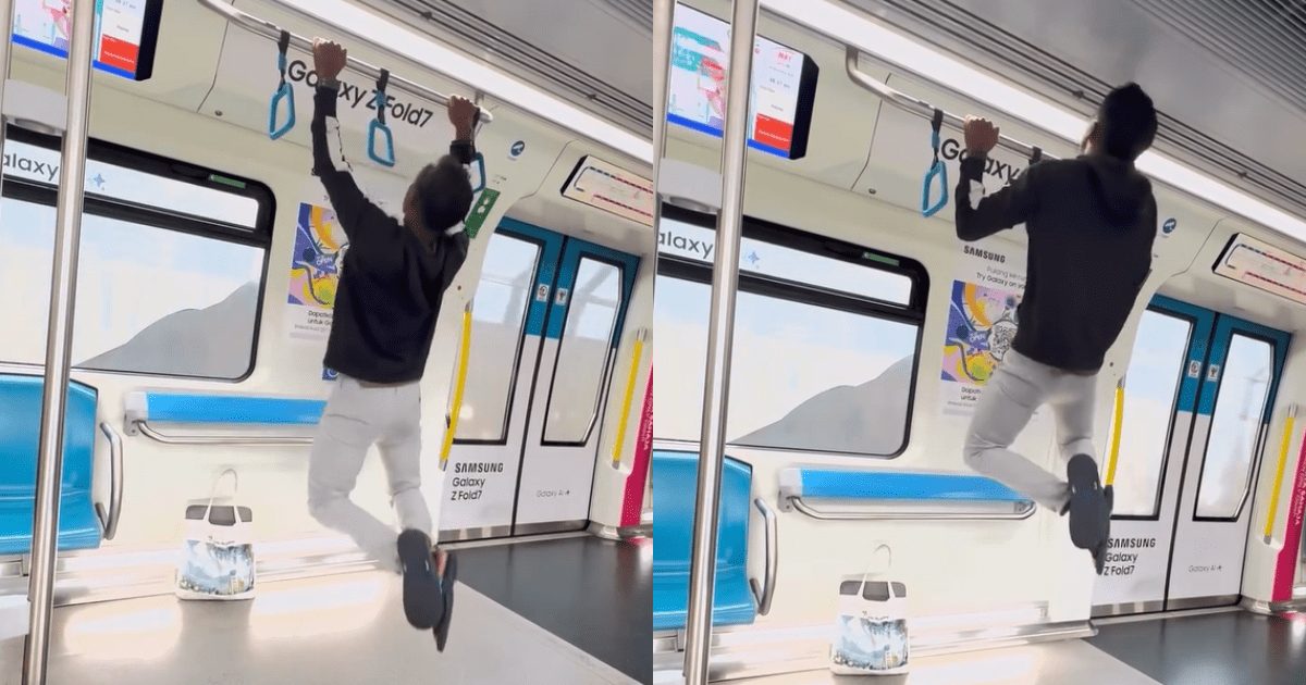 Man does pull-ups inside MRT