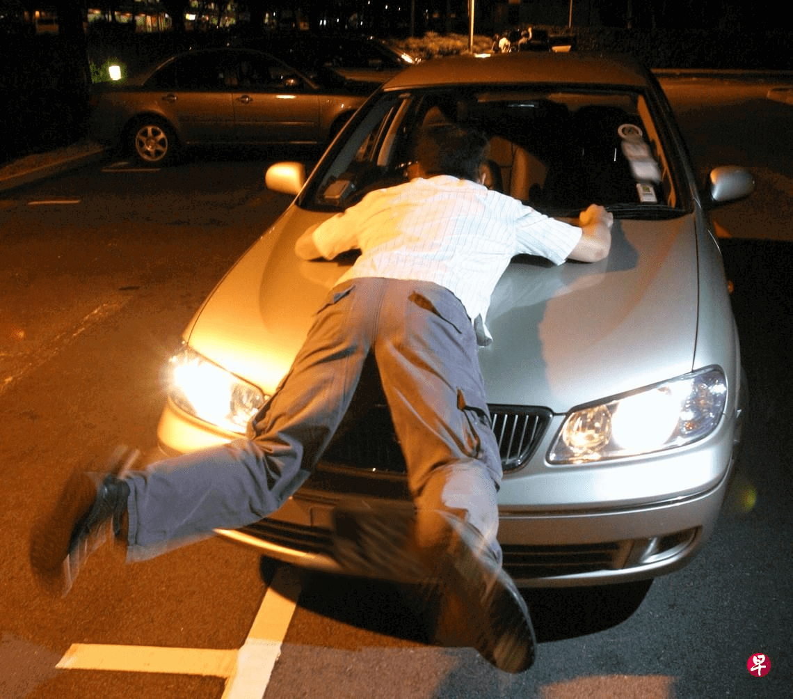 Man getting knocked down by car