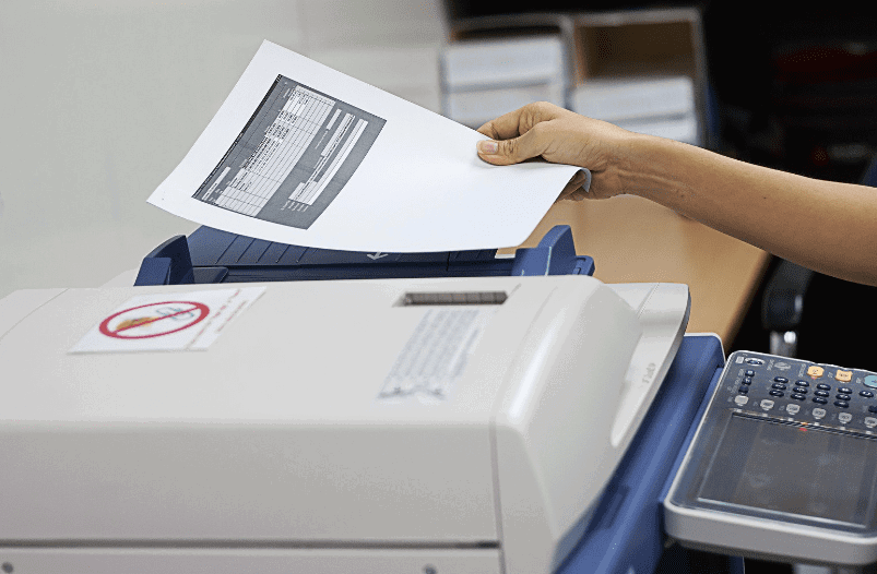 man photocopying