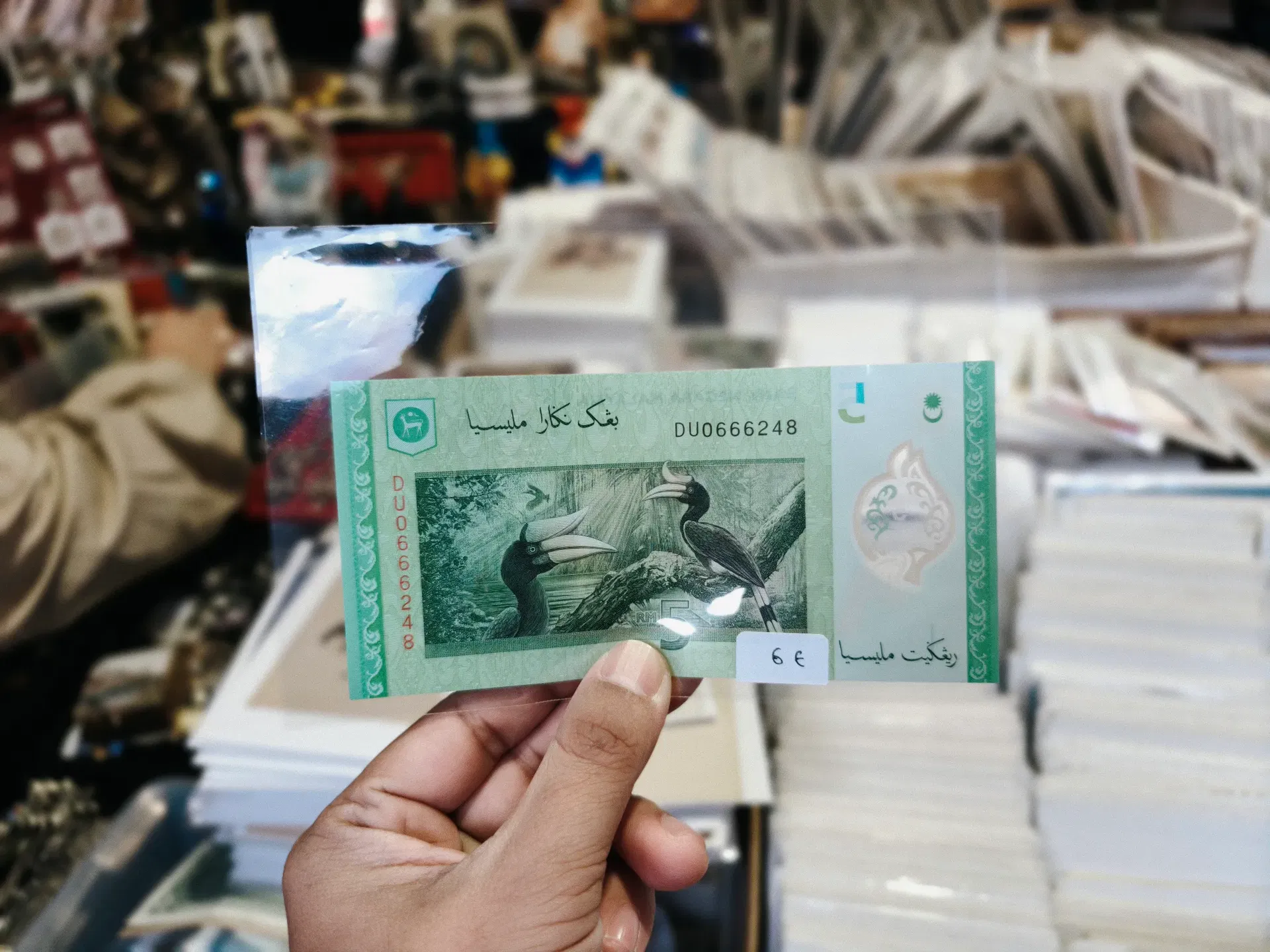 man showing rm5