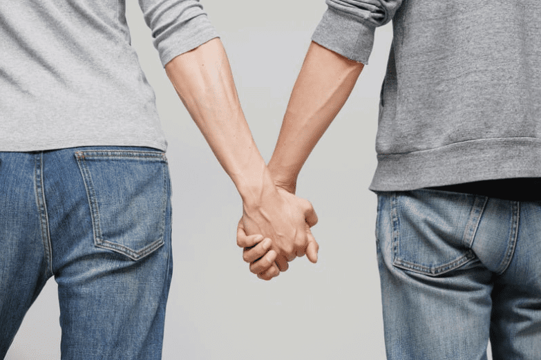 Men holding hands