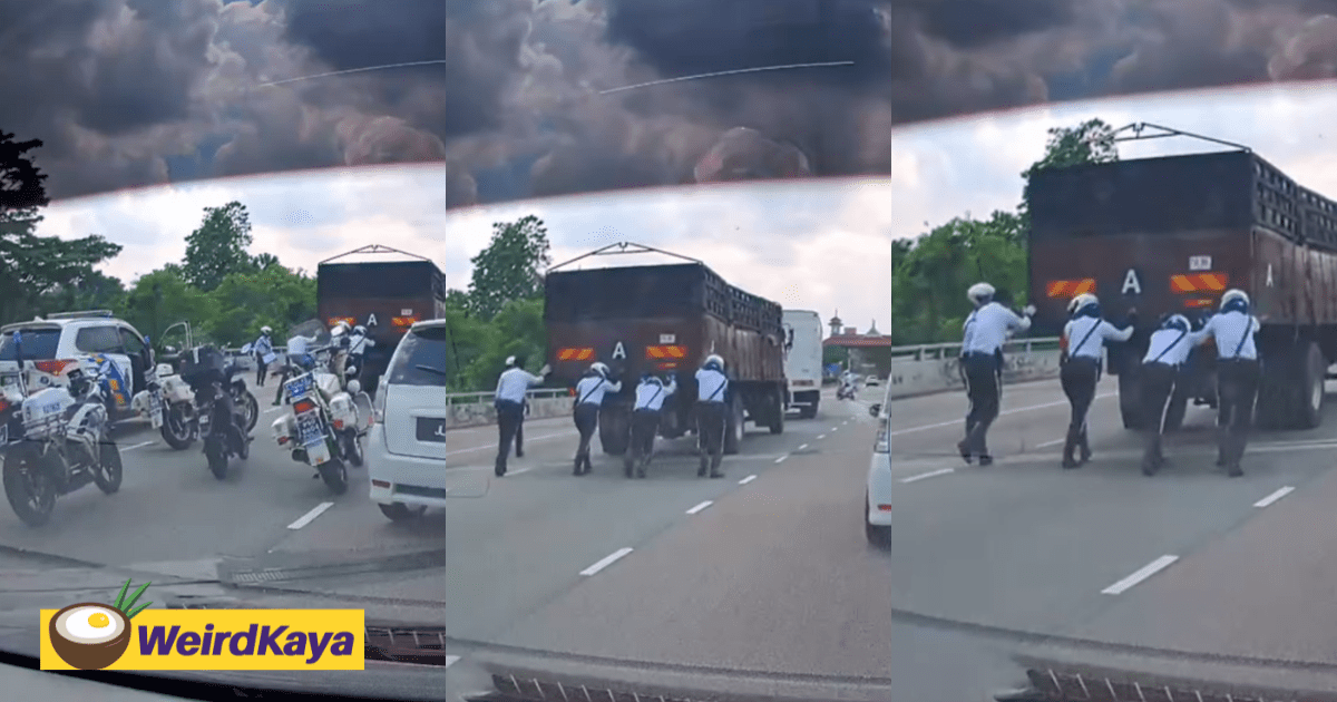 M'sian Traffic Police Praised For Pushing Stalled Truck Off Johor Highway To Clear Traffic