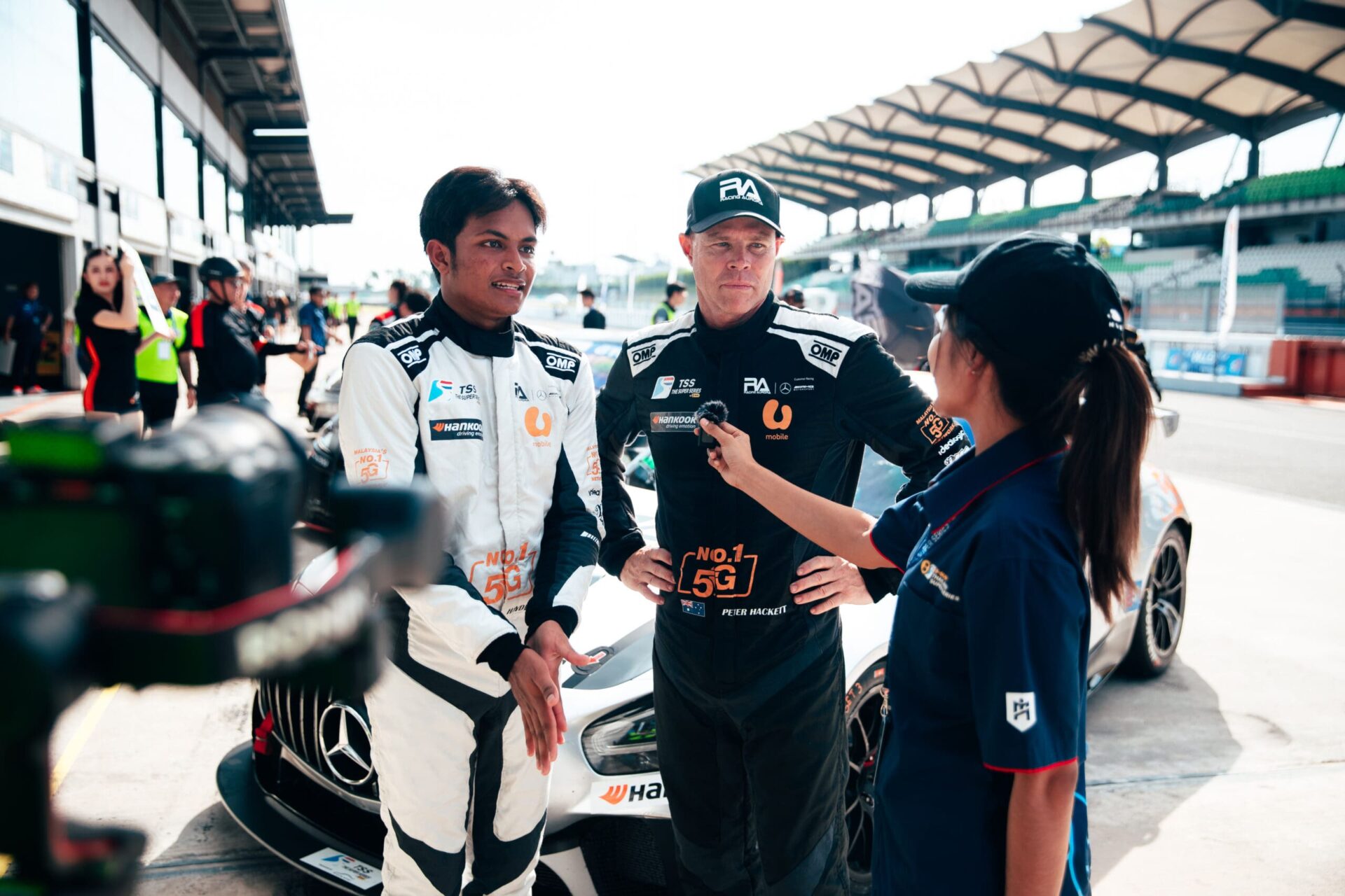 Peter Hackett and Hayden Haikalgcing speech after winning the race