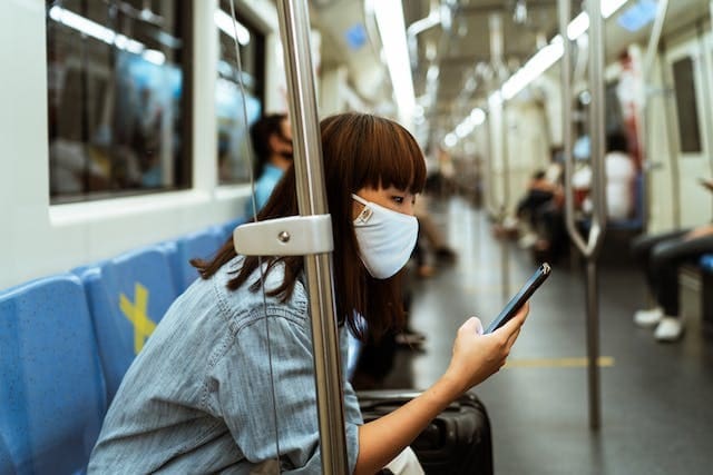 Woman sitting on a train