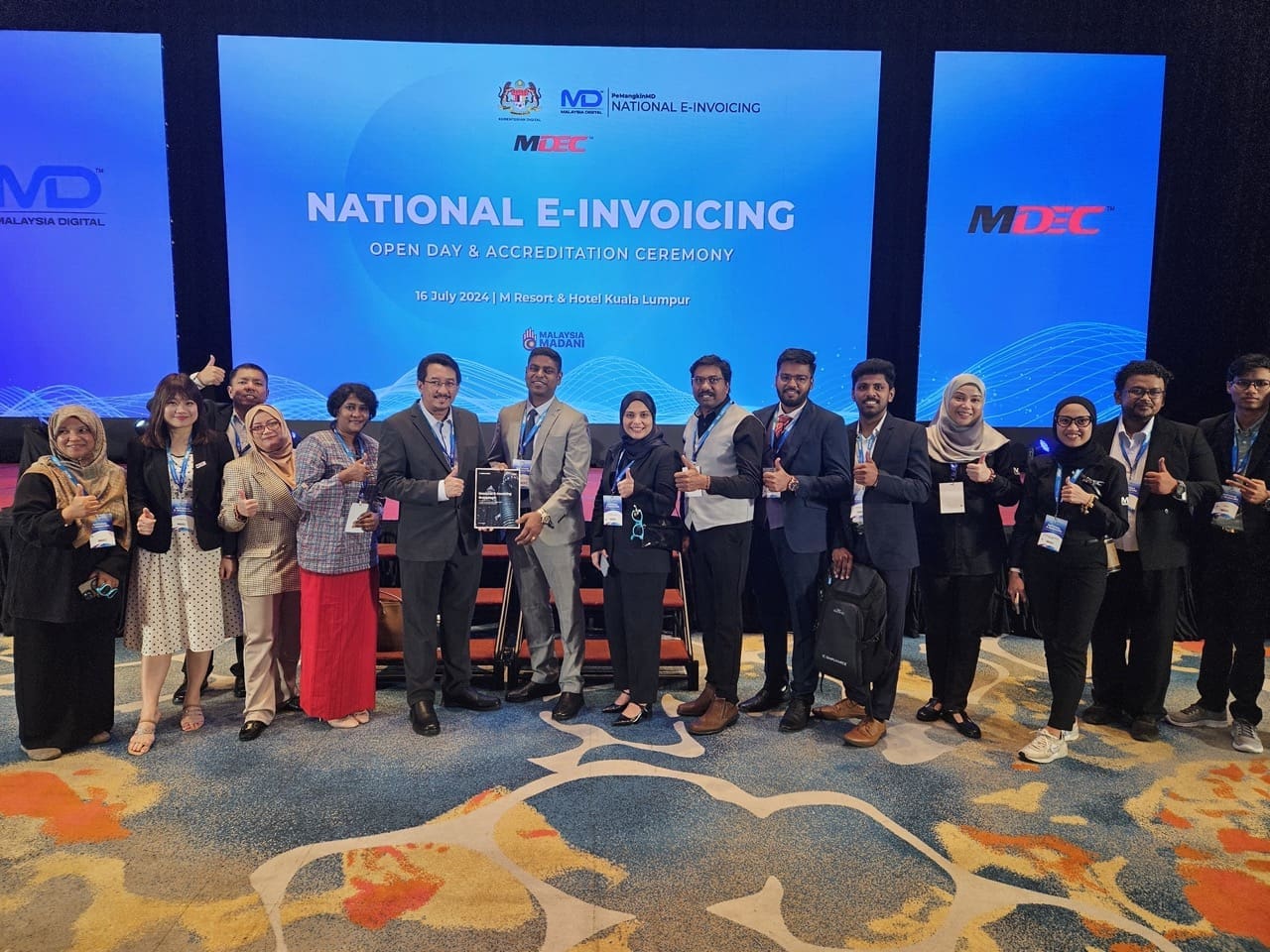 Celebrating MDEC Accreditation Milestone with MDEC Director Mr. Saiful Izwan Mohd Shazali and the MDEC Team.