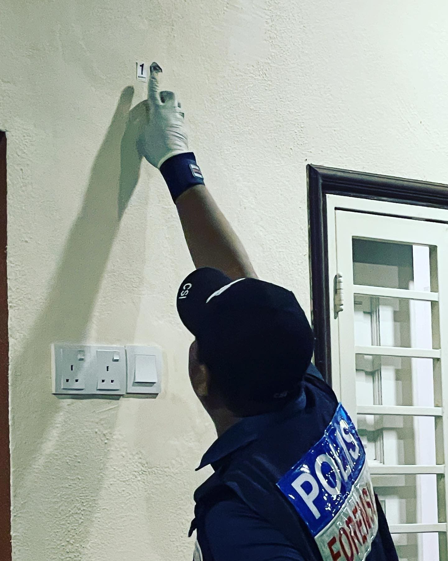 Bullet hole at MyFM DJ Aki's house