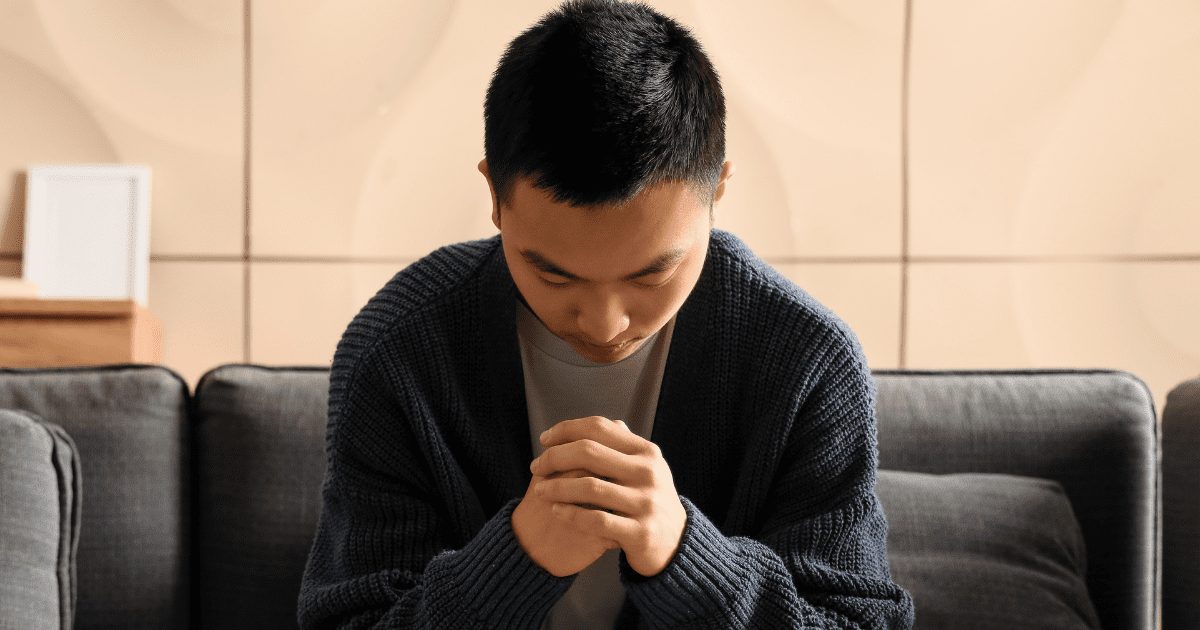 sad asian man