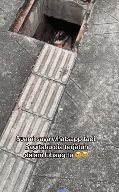 Giant hole along tactile walkway in KL