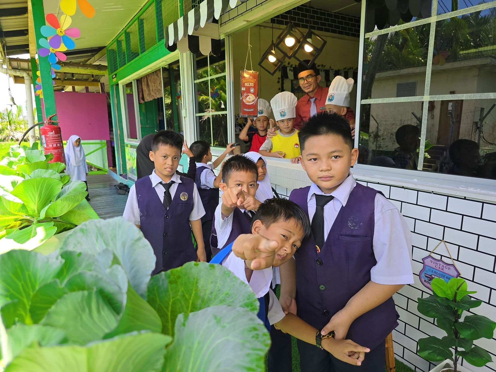 students standing outside tehir cafe class