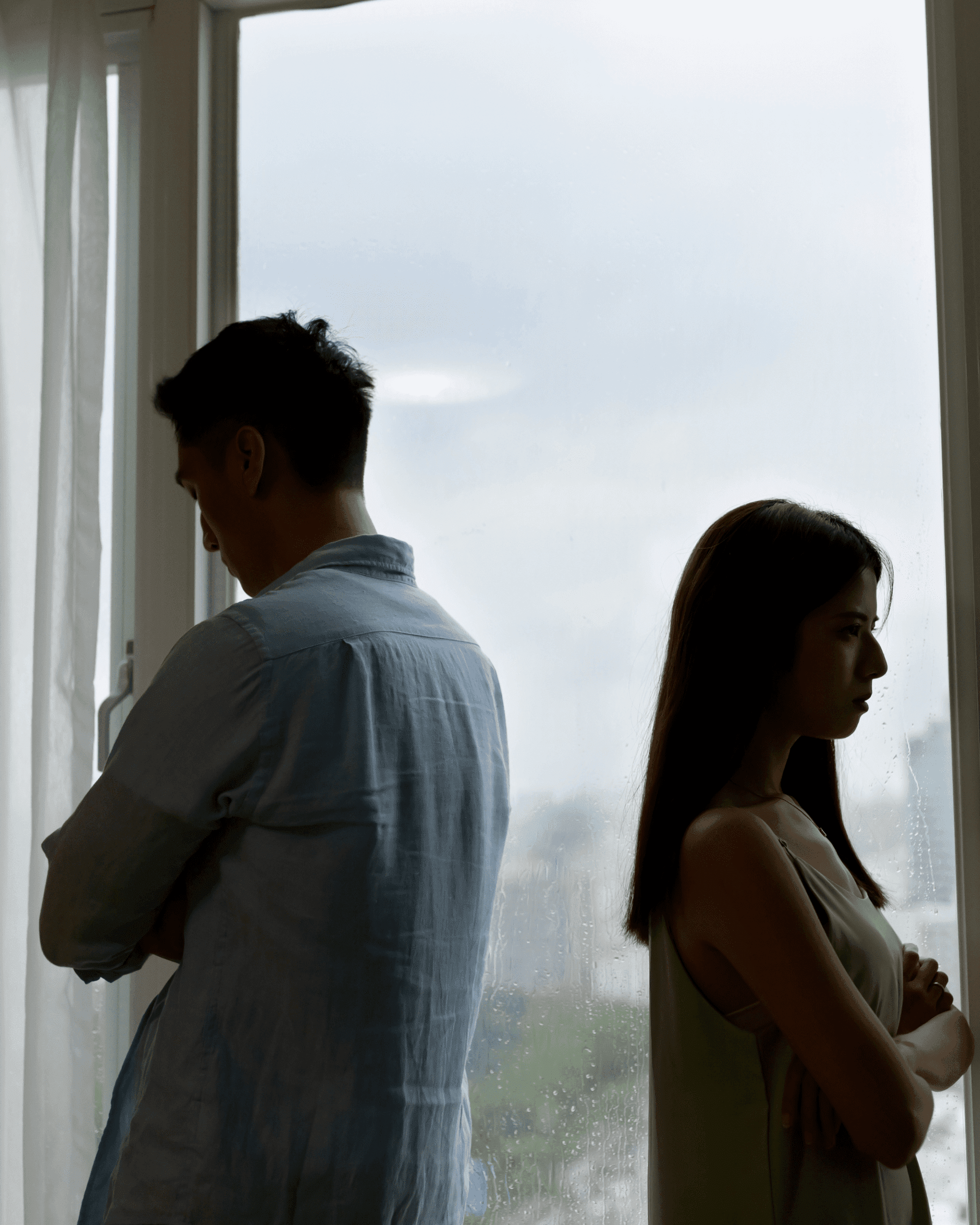 sulking asian couple