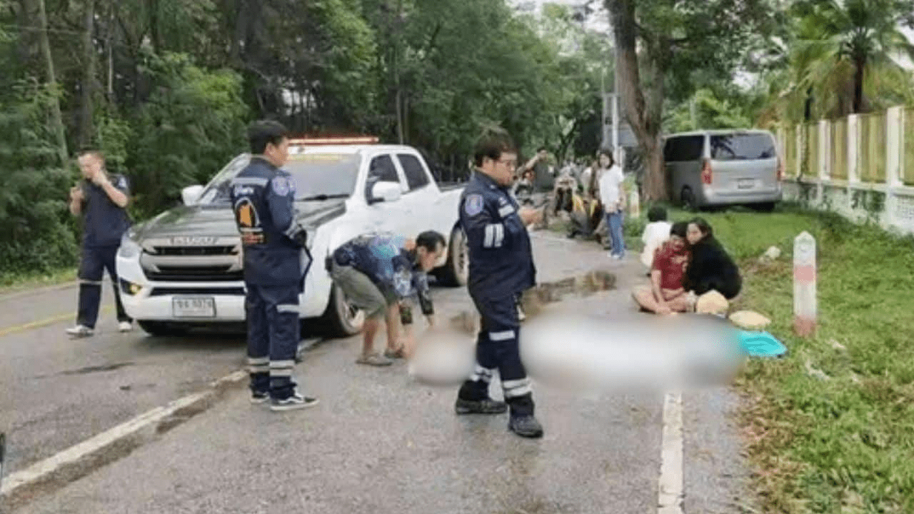 Thai man crying over body of mother