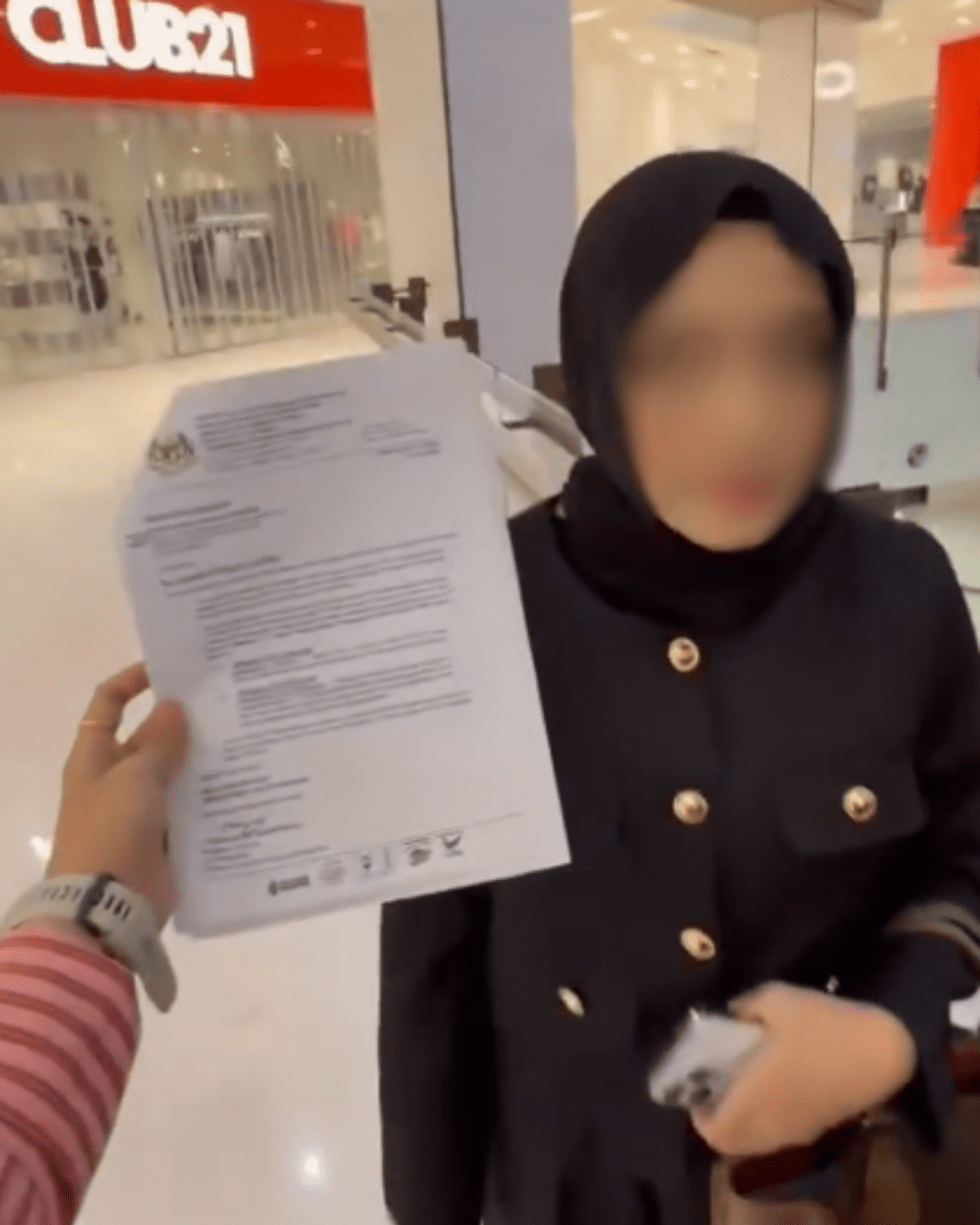 Travel agency owner confronted