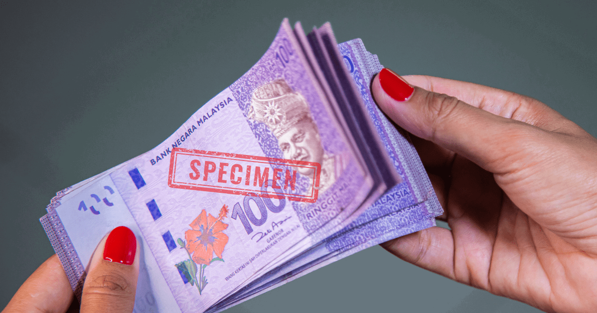 woman counting ringgit